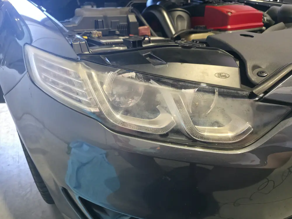 Before: headlights restored