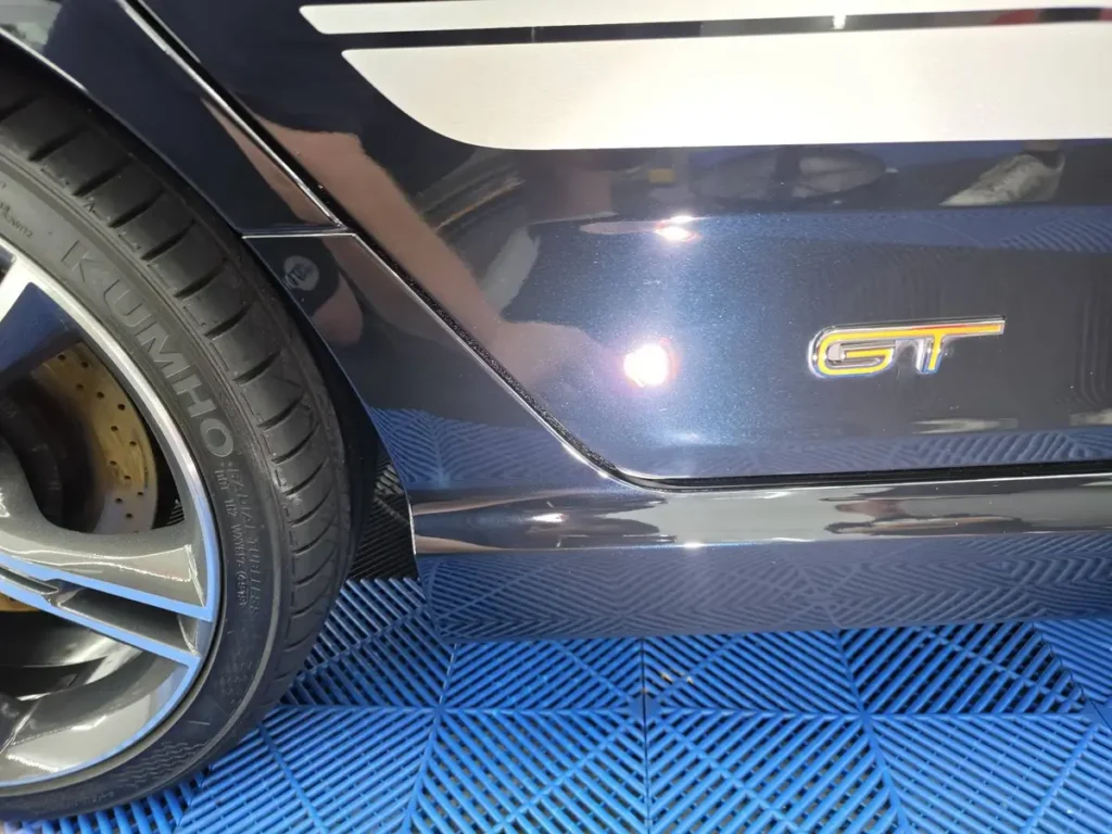 Dark grey paintwork with deep gloss after paint correction